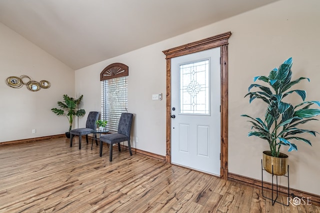 7738 Bison Trl, San Angelo, TX 76901 - entrance foyer with lofted ceiling, light wood-type flooring, and baseboards