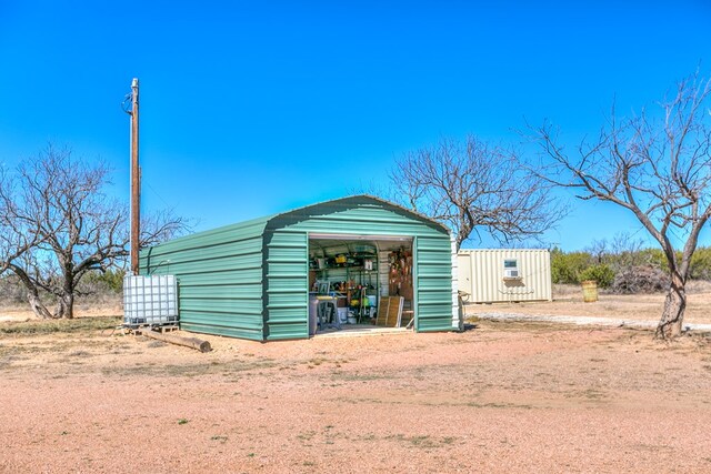 view of outbuilding with an outdoor structure