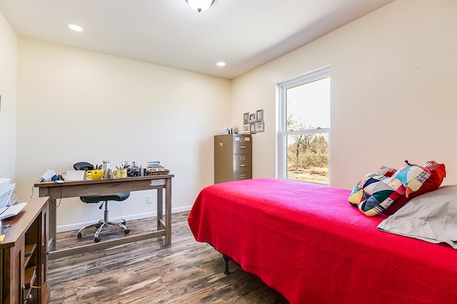 bedroom with recessed lighting, baseboards, and dark wood-style floors