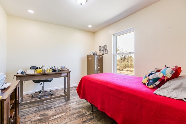 bedroom featuring recessed lighting, dark wood-style flooring, and baseboards