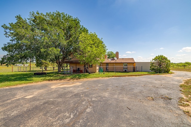 8881 Rust Rd, San Angelo, TX 76905 - view of front facade with a chimney