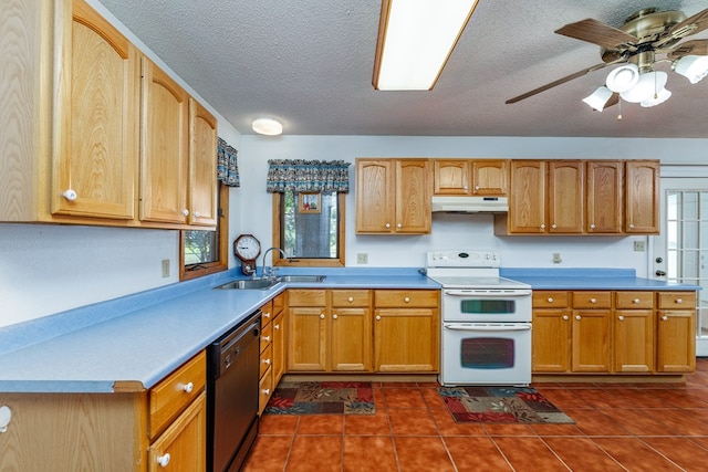 8881 Rust Rd, San Angelo, TX 76905 - kitchen featuring dishwasher, double oven range, under cabinet range hood, a sink, and a textured ceiling