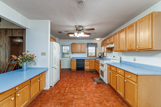 8881 Rust Rd, San Angelo, TX 76905 - kitchen featuring white appliances, ceiling fan, light countertops, under cabinet range hood, and a textured ceiling