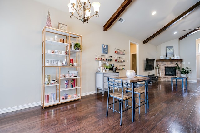 dining room featuring vaulted ceiling with beams, ceiling fan with notable chandelier, dark wood-type flooring, visible vents, and baseboards