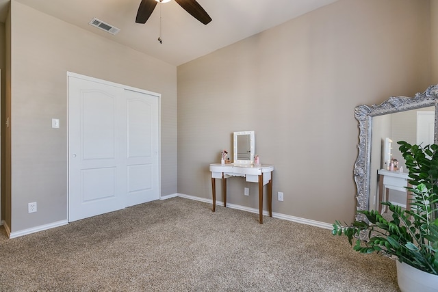 bedroom with carpet, visible vents, ceiling fan, and baseboards