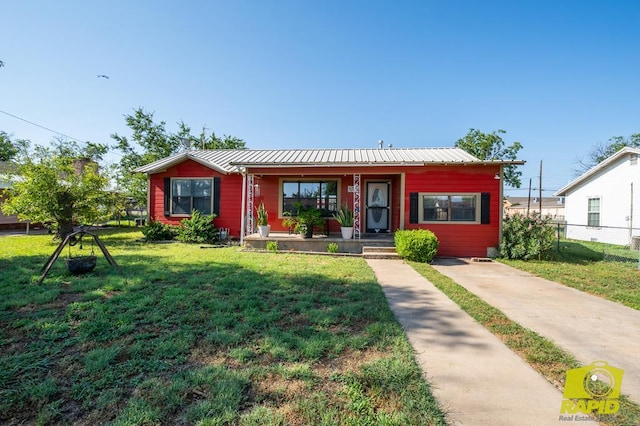 113 N Belaire Ave, San Angelo, TX 76905 - view of front of home featuring covered porch and a metal roof