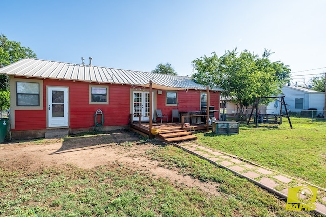 113 N Belaire Ave, San Angelo, TX 76905 - back of property featuring french doors, a deck, and a metal roof