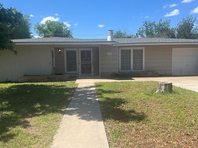 2525 Tcu Ave, San Angelo, TX 76904 - single story home featuring an attached garage, a front lawn, a shingled roof, and driveway