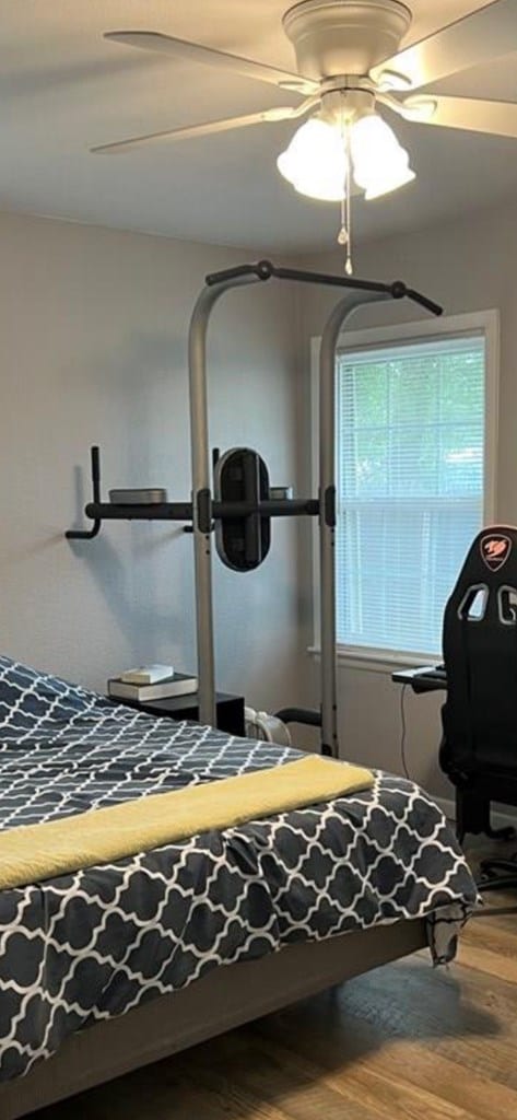 2525 Tcu Ave, San Angelo, TX 76904 - exercise area featuring a ceiling fan and wood finished floors