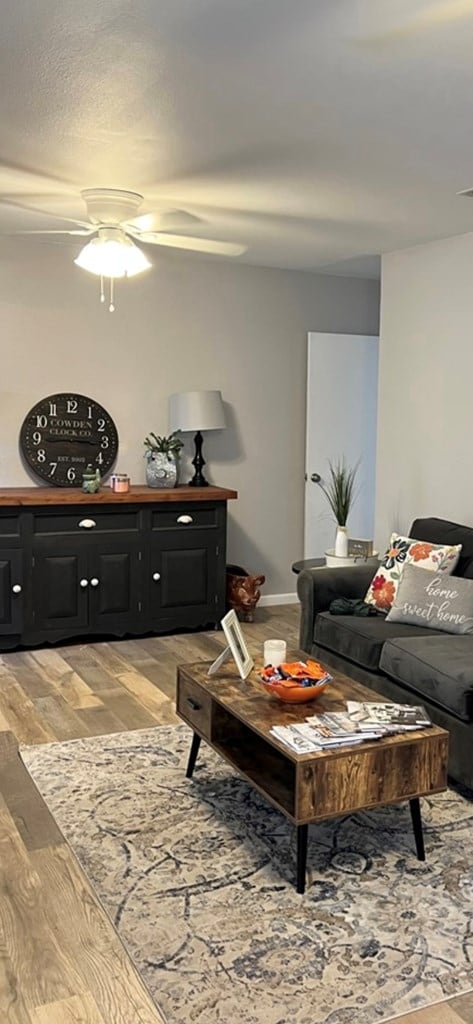 2525 Tcu Ave, San Angelo, TX 76904 - living area with a ceiling fan, light wood-style floors, and baseboards