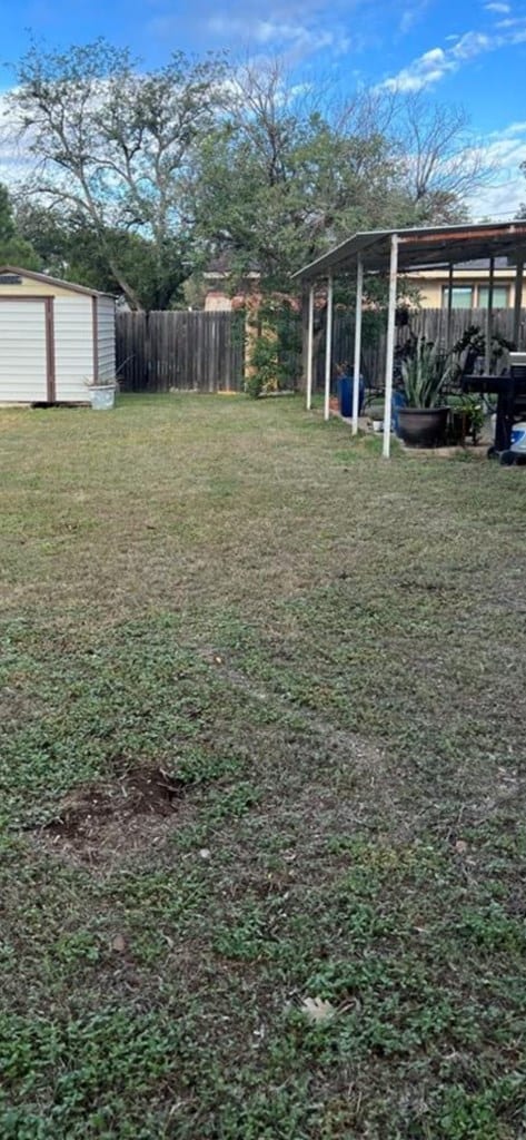 2525 Tcu Ave, San Angelo, TX 76904 - view of yard with a storage unit and an outdoor structure