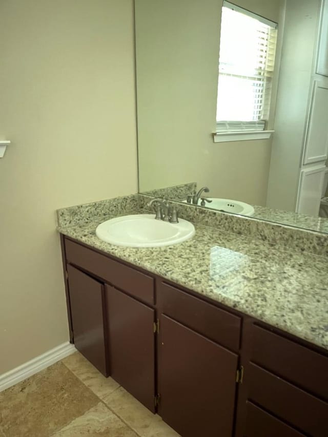 bathroom featuring vanity and tile patterned floors