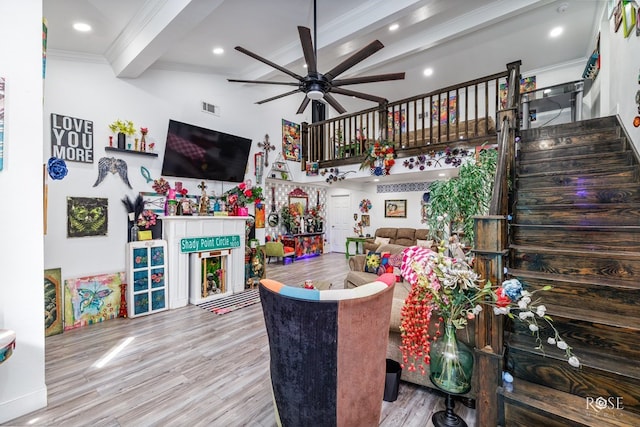 1920 Shady Point Circle Dr, San Angelo, TX 76904 - living room with a ceiling fan, beamed ceiling, ornamental molding, wood finished floors, and stairway