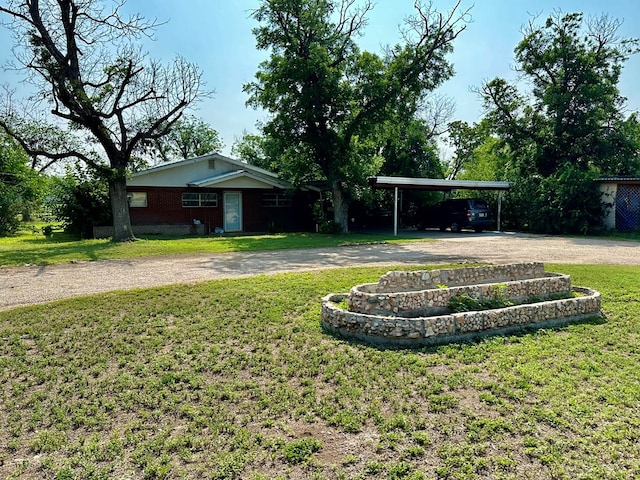 view of yard with a carport