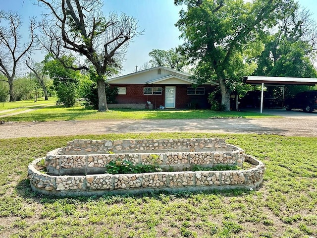 exterior space featuring a carport