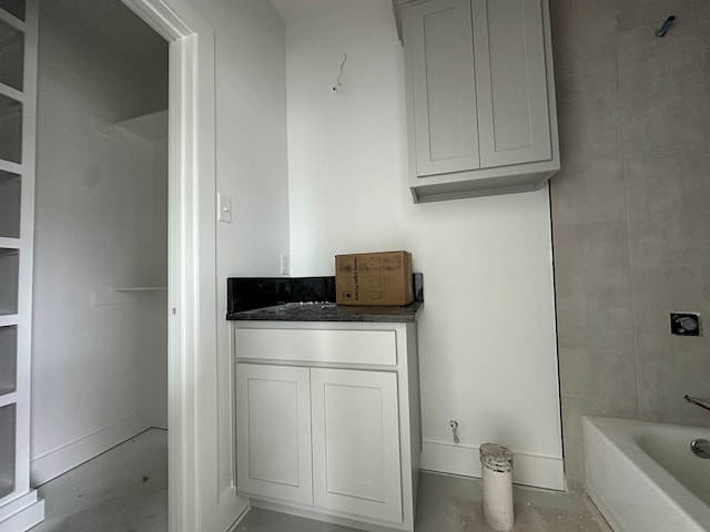full bath featuring vanity