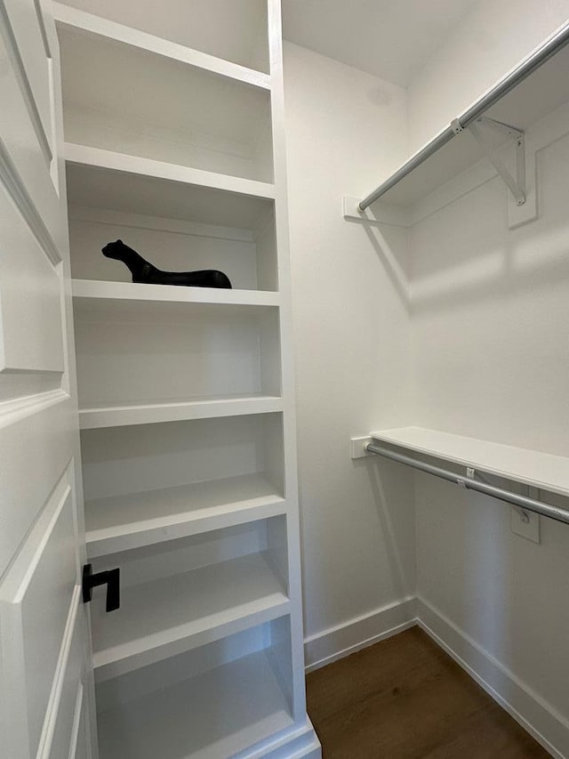 3615 Clearview Dr, San Angelo, TX 76904 - spacious closet with dark wood-style flooring