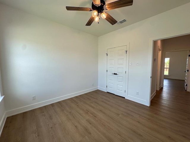 3615 Clearview Dr, San Angelo, TX 76904 - unfurnished room with wood finished floors and a ceiling fan