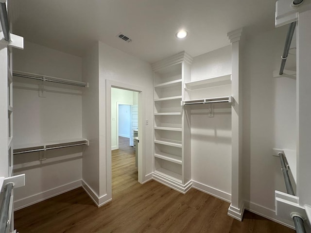 3615 Clearview Dr, San Angelo, TX 76904 - walk in closet featuring dark wood-style floors