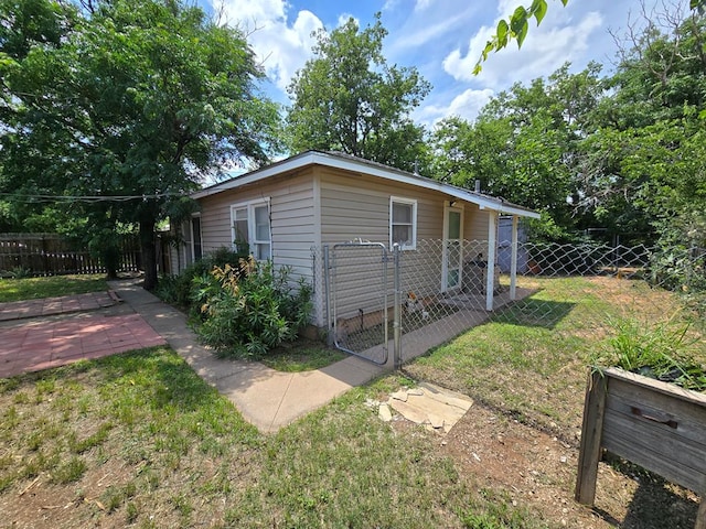 42 W 26th St, San Angelo, TX 76903 - view of front of house with a gate