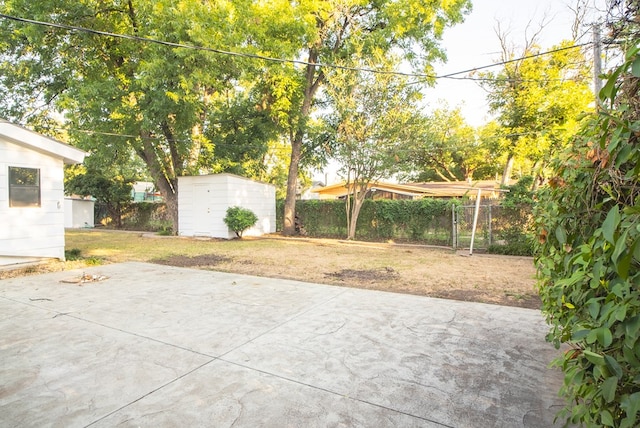 view of patio / terrace with a storage shed