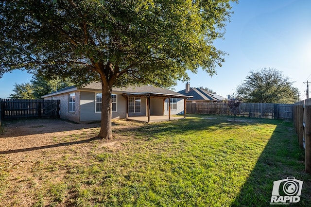 view of yard featuring a patio area