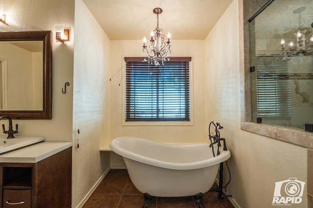 bathroom with a notable chandelier, separate shower and tub, and tile patterned floors