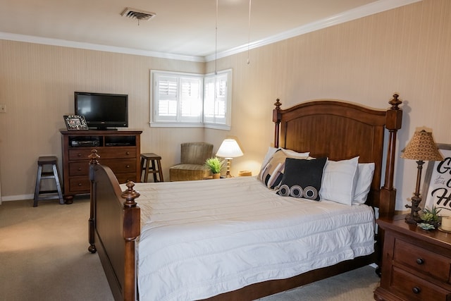 carpeted bedroom featuring ornamental molding