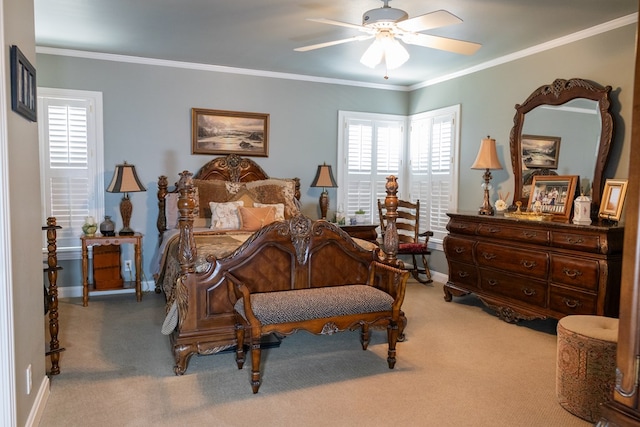 bedroom with ornamental molding, light carpet, and ceiling fan