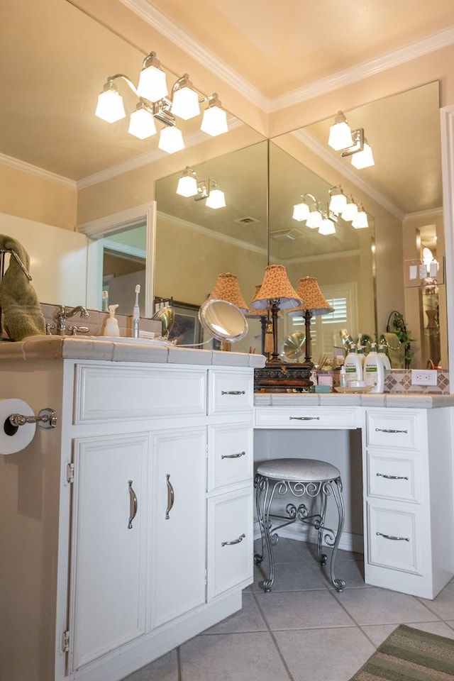 bathroom featuring tile patterned flooring, vanity, and crown molding