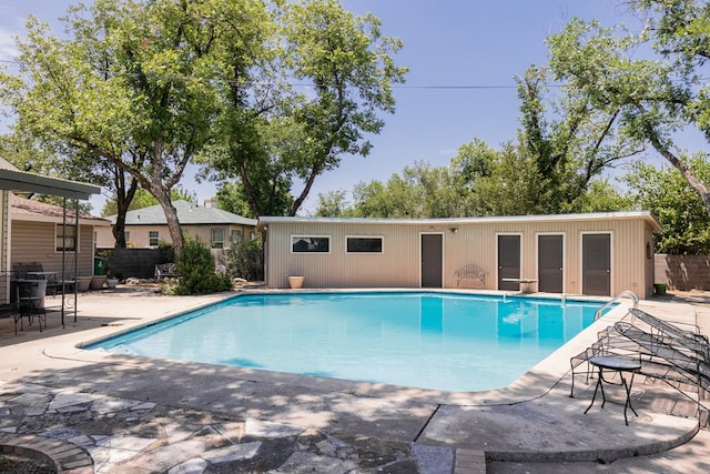 view of pool featuring a patio