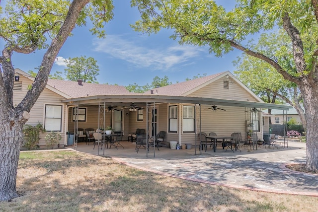 back of house featuring ceiling fan and a patio area