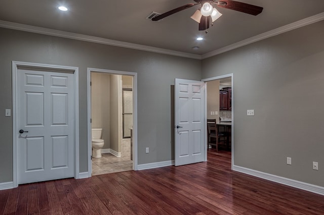 7164 Texas Unit R2, Del Rio, TX 78840 - unfurnished bedroom with ornamental molding, connected bathroom, dark wood-type flooring, ceiling fan, and recessed lighting