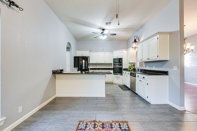 6026 Warwick Dr, San Angelo, TX 76901 - kitchen with black appliances, dark countertops, a peninsula, and a ceiling fan