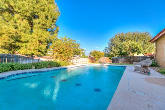 6026 Warwick Dr, San Angelo, TX 76901 - view of swimming pool with a fenced backyard and a patio area