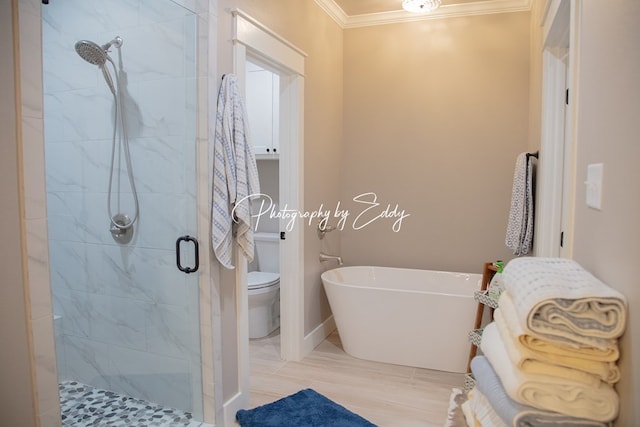 bathroom with crown molding, toilet, and shower with separate bathtub