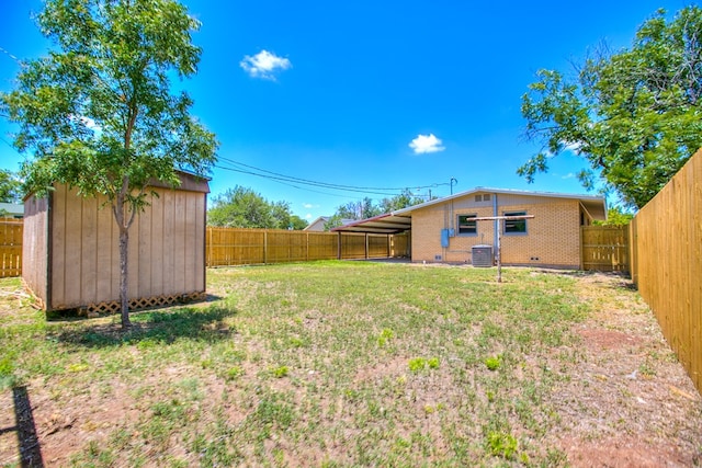 2235 Chestnut St, San Angelo, TX 76901 - fenced backyard featuring a shed and an attached carport