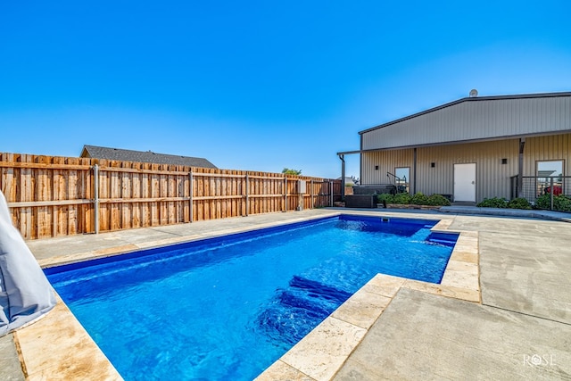 view of pool with a patio