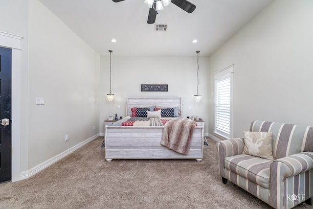 carpeted bedroom featuring ceiling fan