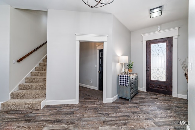 entrance foyer featuring dark wood-type flooring