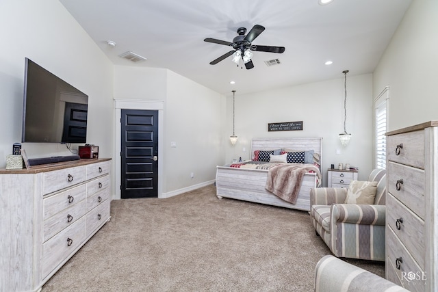 bedroom featuring ceiling fan and light colored carpet