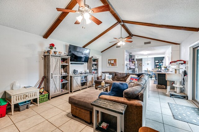 3213 Sunset Dr, San Angelo, TX 76904 - living room featuring a textured ceiling, ceiling fan, and light tile patterned floors