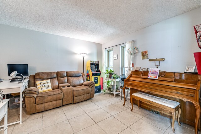 3213 Sunset Dr, San Angelo, TX 76904 - living area with a textured ceiling and light tile patterned floors