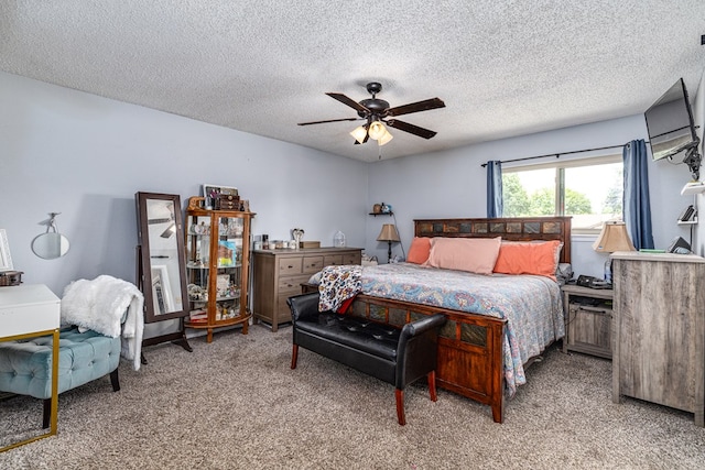 3213 Sunset Dr, San Angelo, TX 76904 - bedroom featuring carpet, a textured ceiling, and ceiling fan