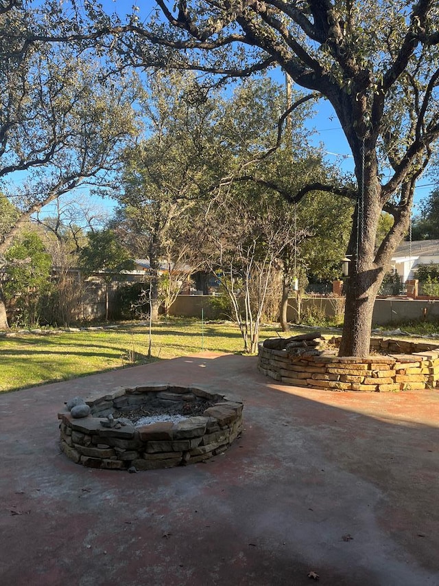 view of patio / terrace with a fire pit