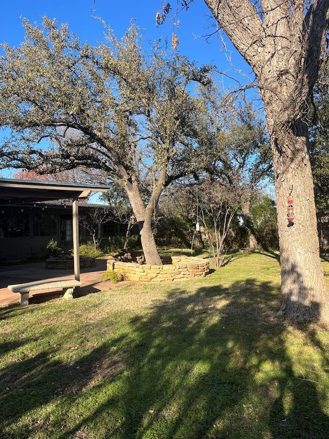 view of yard with a wooden deck