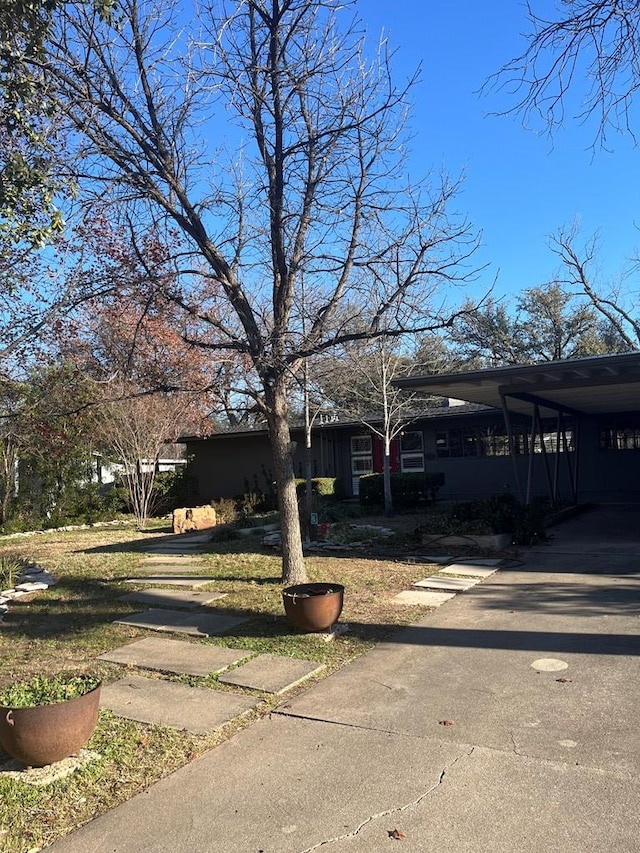 view of front of house featuring a carport