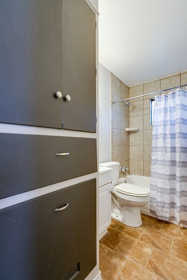 full bathroom featuring vanity, shower / tub combo with curtain, and toilet