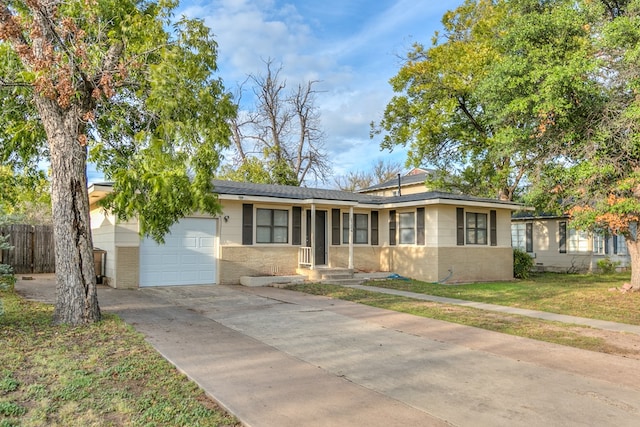 single story home with a garage