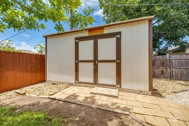 25 Dellwood Dr, San Angelo, TX 76903 - view of shed with a fenced backyard